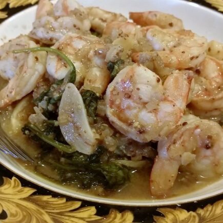 Finished bowl of spicy mustard shrimp searved in pasta bowl