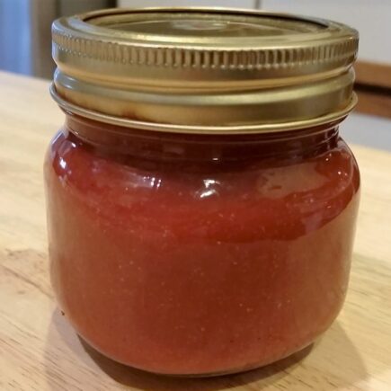 Finished ketchup in small mason jar