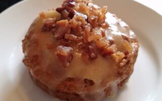 Low Carb Maple Glazed Bacon Donut on white plate