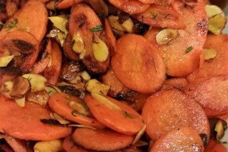 Close-up view of finished carrots almondine