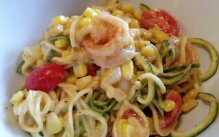 Persimmon Shrimp Pasta Salad seved in white bowl