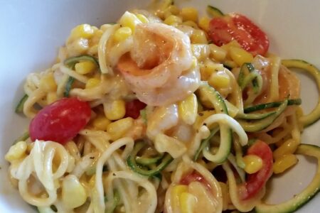 Persimmon Shrimp Pasta Salad seved in white bowl